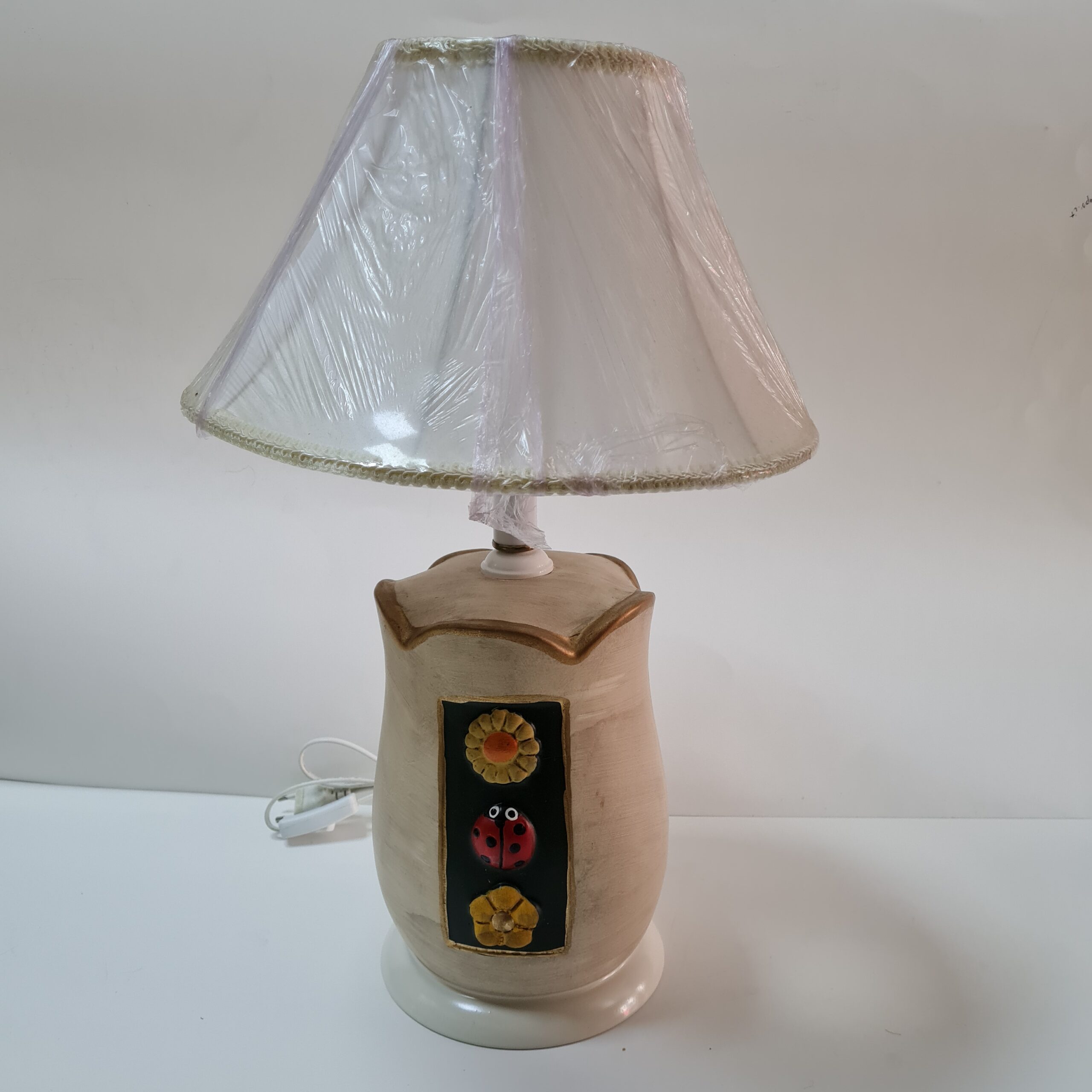 Lampada fiori e coccinella